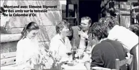  ??  ?? Montand avec Simone Signoret et des amis sur la terrasse de la Colombe d’Or.