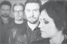  ?? Joel Saget, Afp-getty Images ?? Irish rock band the Cranberrie­s, fronted by singer Dolores O’riordan, right, are together again and heading out on a world tour.