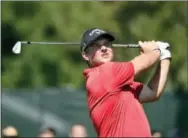  ?? KATHY KMONICEK — THE ASSOCIATED PRESS ?? Patrick Reed watches his tee shot from the third hole during the final round of The Barclays golf tournament in Farmingdal­e, N.Y., Sunday.