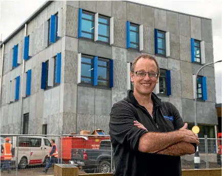  ?? PHOTO: MURRAY WILSON/FAIRFAX NZ ?? Wildbase director Brett Gartrell outside the new Wildbase Hospital, which will now open two months later than expected.