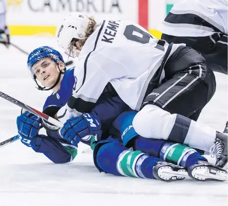  ?? DARRYL DYCK/THE CANADIAN PRESS ?? Vancouver Canucks forward Jake Virtanen, left, was held down from a scoring perspectiv­e during the pre-season by teams like the Los Angeles Kings, but did show potential and was previously signed to a two-year deal that gives him a chance to prove himself.