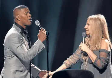  ??  ?? Jamie Foxx duets with Barbra Streisand on her latest star-studded album.