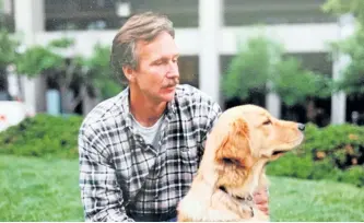  ?? VAL KOZIOL PHOTO ?? Rick Durst pictured with his Golden Retriever Rusty. Durst wrote his own obituary before his death.