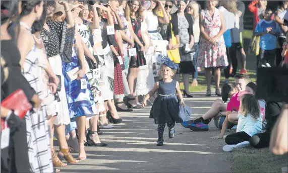  ?? Picture: PAUL CARRACHER ?? MY TURN: Chanel Baxter steals the limelight during Stawell Gift fashions on the field.