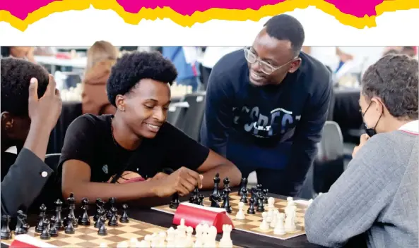  ?? Photo: Contribute­d ?? Chess in session… Matjiua Kajovi (standing) with Kevin Karuhumba and other learners of St George’s during a chess lesson.