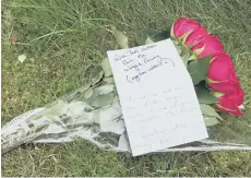  ??  ?? Floral tributes left at the zoo gates