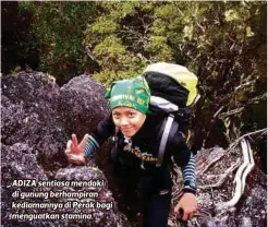 ??  ?? ADIZA sentiasa mendaki di gunung berhampira­n kediamanny­a di Perak bagi menguatkan stamina.
