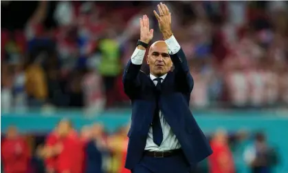  ?? ?? Roberto Martínez waves goodbye to Belgium’s supporters after the 0-0 draw with Croatia. Photograph: Quality Sport Images/Getty Images