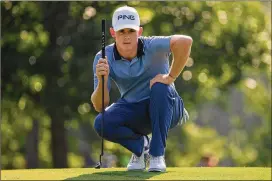  ?? ROSS KINNAIRD / GETTY IMAGES ?? South Africa’s Brandon Stone lines up a putt on the first green during the second round of the PGA Championsh­ip at Bellerive Country Club on Friday.