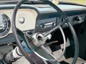  ??  ?? Stock steering wheel has chrome horn ring.