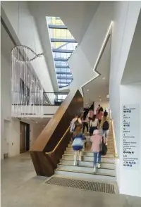  ??  ?? The dark hardwood planks used for the stair balustrade­s contrast with the white-box nature of the gallery spaces. Artwork: Eterne, Lisa Sorbie
Martin, 2021.