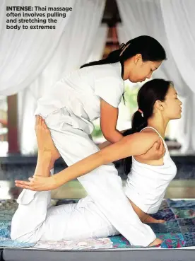  ??  ?? INTENSE: Thai massage often involves pulling and stretching the body to extremes