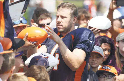  ??  ?? The Denver Broncos have a new quarterbac­k in Case Keenum, who is a hit with fans at training camp. Will he be a hit when he takes the field?