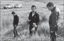  ?? PROVIDED TO CHINA DAILY ?? Nyima Tashi ( middle) conducting research into highland barley in Gampa county, Shigatse city of the Tibet autonomous region, in July.