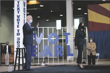  ?? ASSOCIATED PRESS ?? DEMOCRATIC PRESIDENTI­AL CANDIDATE FORMER Vice President Joe Biden and Democratic vice presidenti­al candidate Sen. Kamala Harris, D-Calif., visit the Carpenters Local Union 1912 in Phoenix on Thursday.