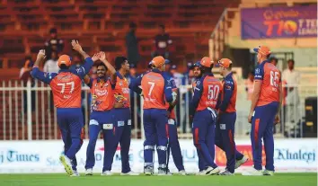  ?? Atiq Ur Rehman/Gulf News ?? Aamer Yamin of Bengal Tigers celebrates after claiming four wickets in as many balls during the match against Northern Warriors at the Sharjah Cricket Stadium yesterday.