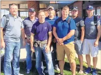  ?? SUBMITTED PHOTO BY SHARON HUGHES ?? Maritime Electric employees, from left, Bruce Turner, Richie Hughes, Ashley Keenan, Phillip Henderson, Grant Boswell, Tyler Pineau and Troy Worth stand outside the Charlottet­own Airport Saturday morning before heading to the Turks and Caicos Islands to...