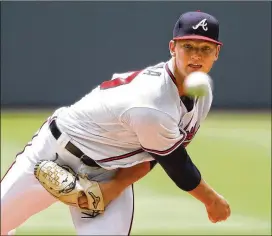  ?? CURTIS COMPTON / CCOMPTON@AJC.COM ?? Braves pitcher Mike Soroka lowered his ERA to 2.57 for the season, helping his team to a 2-0 win over the Mets on Wednesday.
