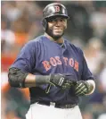  ?? Bob Levey / Getty Images ?? David Ortiz helped the Red Sox to three World Series titles.