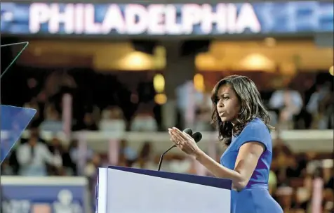  ??  ?? First lady Michelle Obama addresses the Democratic National Convention on Monday night at the Wells Fargo Center.