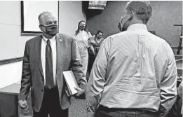  ?? SAMUEL METZ/AP ?? Nevada Gov. Steve Sisolak exits a news conference Wednesday after announcing Nevada would join California, Washington and North Carolina in requiring masks in public.