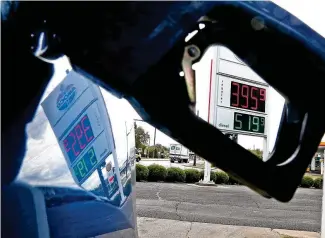  ?? BILL LACKEY / STAFF ?? Gas prices in Springfiel­d are hovering just below $4.00 per gallon Thursday.