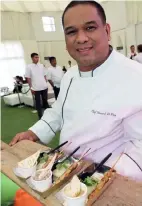  ??  ?? Chef Howard Dizon shows a sumptuous snack from his booth during the Grand Family Palooza.