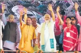  ?? RAJESH KUMAR/HT ?? Uttar Pradesh governor Ram Naik (left), chief minister Yogi Adityanath and Prime Minister Narendra Modi with other BJP leaders at a public meeting in Mirzapur on Sunday.