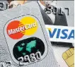  ?? MARTIN MEISSNER/AP ?? Merchants have accused Visa and Mastercard of violating antitrust laws.