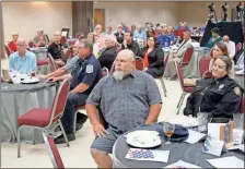  ?? Doug Walker ?? The Palladium was packed Monday for the annual Respect for Law luncheon hosted by the Rome Noon Optimist, Lions, Exchange and Kiwanis clubs. Representa­tives from seven local agencies were honored.