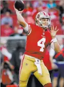  ?? Heidi Fang ?? Las Vegas Review-journal Rookie 49ers quarterbac­k Nick Mullens threw for three touchdowns Thursday in San Francisco’s 34-3 victory over the Raiders in Santa Clara, Calif.