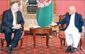  ?? AFP ?? US Secretary of State Mike Pompeo (left) meets Afghan President Ashraf Ghani. Pompeo arrived in the Afghan capital on Monday amid multiple crises.