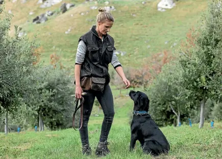  ?? DANIELA AEBLI PHOTOGRAPH­Y ?? Jax Lee of Kings Truffles and her truffle dog make a living from what is considered the world’s most expensive food.