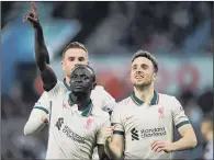  ?? PICTURE: PA ?? WINNER: Liverpool’s Sadio Mane celebrates scoring the winner with team-mates Diogo Jota (right) and Jordan Henderson.