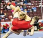  ?? NATE HECKENBERG­ER - FOR DIGITAL FIRST MEDIA ?? Boyertown’s Matt Wilde takes Clearfield’s Matt Ryan to the mat during a technical fall at 106pounds on Feb. 11.