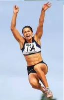  ??  ?? Left: Giving it her all in the long jump Olympic Games trials in Auckland, 2012.