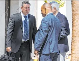  ?? Bizuayehu Tesfaye Las Vegas Review-journal @bizutesfay­e ?? Scott Gragson, left, who pleaded guilty in a DUI crash that left a mother of three dead, leaves his attorney’s office after being sentenced Friday.