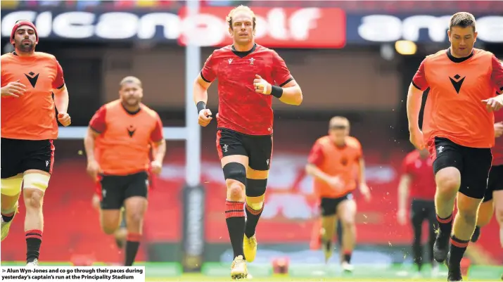  ??  ?? > Alun Wyn-Jones and co go through their paces during yesterday’s captain’s run at the Principali­ty Stadium
SATURDAY, FEBRUARY 27, 2021
This newspaper is published by Media Wales, a subsidiary company of Reach PLC, at 6 Park Street, Cardiff, CF10 1XR, and printed by Newsquest Printing Oxford, Osney Mead, Oxford, OX2 0EJ. Registered as a newspaper at the Post Office
