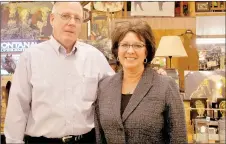  ?? RACHEL /MCDONALD DICKERSON COUNTY PRESS ?? David and Kitty Collingswo­rth of Dave’s Supermarke­t in Southwest City are pictured near a selection of gift items.