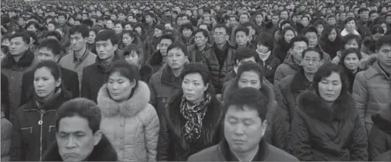  ?? JON CHOL JIN, THE ASSOCIATED PRESS ?? North Koreans gather during a mass rally early in January to vow to carry through the tasks set forth by North Korean leader Kim Jong Un in his New Year’s address.