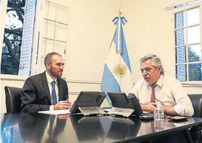 ?? (PRESIDENCI­A) ?? Negociador­es. El ministro Martín Guzmán y el presidente Alberto Fernández.