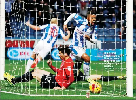  ?? PICTURE: Action Images ?? KER-CHING: Huddersfie­ld’s Elias Kachunga celebrates their third goal against Brighton