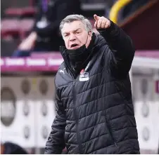  ?? — AFP photo ?? West Bromwich Albion manager Sam Allardyce looks on from the sideline during the English Premier League match against Burnley at Turf Moor in Burnley, in this Feb 20 file photo.