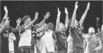  ?? STEPHEN M. DOWELL/ORLANDO SENTINEL ?? Orlando City celebrates after Nani hit the clinching penalty kick against LAFC during the MLS is Back Tournament.