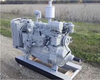  ?? Image by Kent Bates ??  This is a 1941 Cat D3400 power unit and you can clearly see the two-cylinder, 10hp gasoline pony engine mounted over the bellhousin­g and geared to the flywheel via a clutch. The pony engine could be manually started with a rope or, as shown, with a...