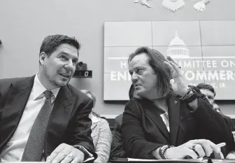  ?? Jose Luis Magana / Associated Press ?? Sprint Corp. executive chairman Marcelo Claure, left, and T-Mobile US CEO and president John Legere appear before the House Energy and Commerce subcommitt­ee Wednesday.