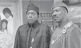  ?? PROVIDED BY QUANTRELL D. COLBERT ?? Arsenio Hall, left, and Eddie Murphy reprise their roles as Semmi and Prince Akeem in “Coming 2 America.”