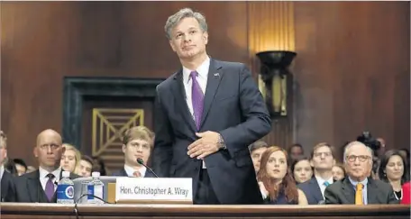  ?? Pablo Martinez Monsivais Associated Press ?? “NO ONE has asked me for any kind of loyalty oath ... and I sure as heck did not offer one,” FBI nominee Christophe­r A. Wray testified.