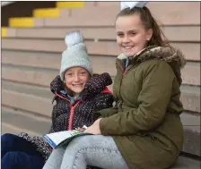  ??  ?? Young Listowel racegoers Sarah Cox and Grace Hart look like they’re becoming solid fans of the sport of kings.