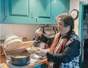  ?? ?? Sharon Cohen now regularly prepares lunch at home in Newtown, Conn.